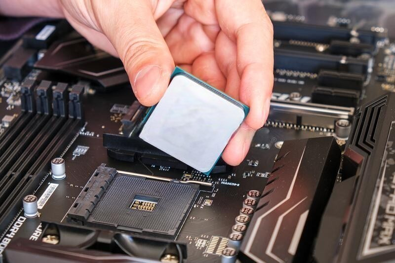 there should be an image of a person building a computer here!